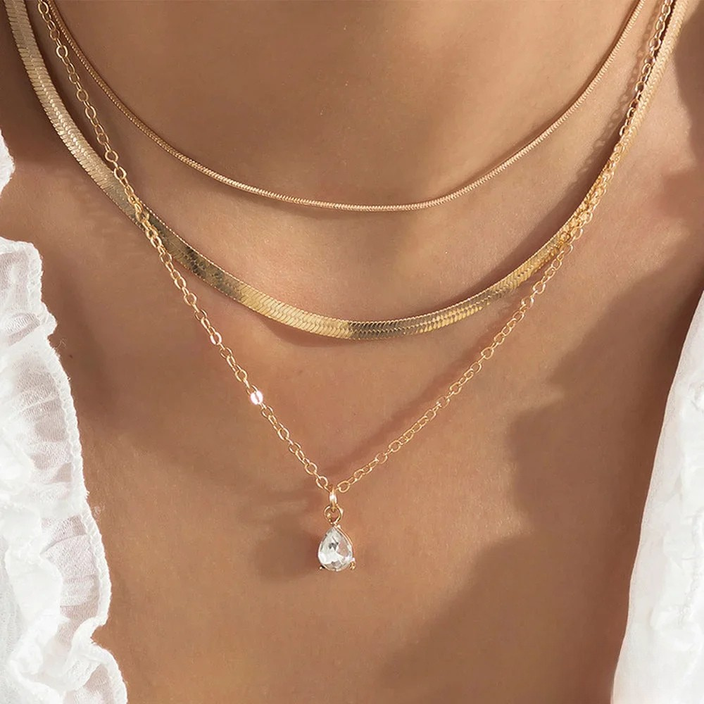 Layered necklace with gold-plated zirconia pendant