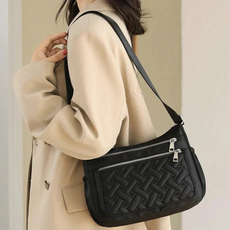 Claudine™ | Nylon shoulder bag with messenger style